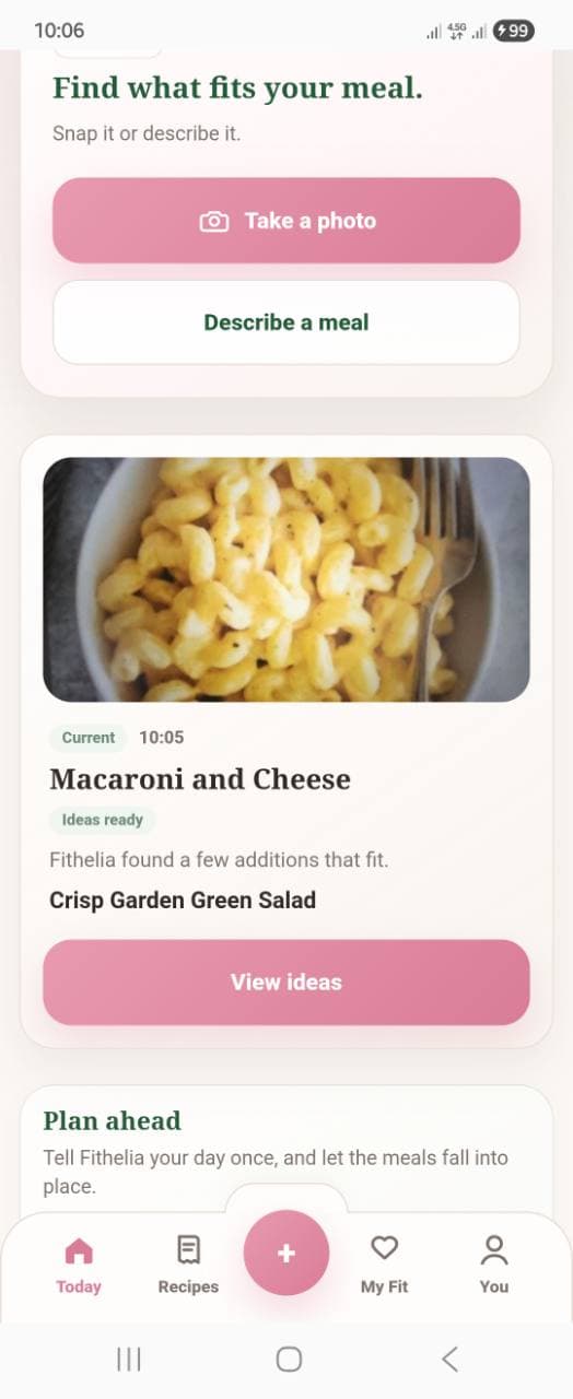 Fithelia home screen showing a macaroni and cheese meal card with ideas ready and a View ideas action.
